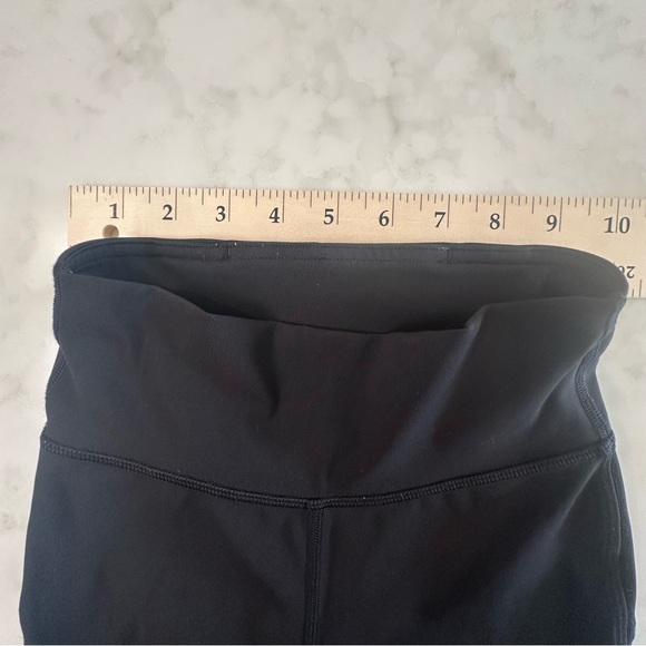 Lululemon Black “Tied to it” High Rise Leggings with mesh/tied ankle detail. - Picture 8 of 13
